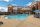 Swimming pool with poolside seating